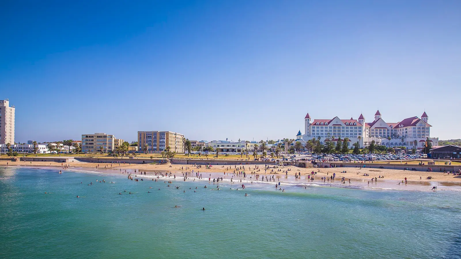 Swimmers on the Port Elizabeth beachfront with the Boardwalk hotel behind
