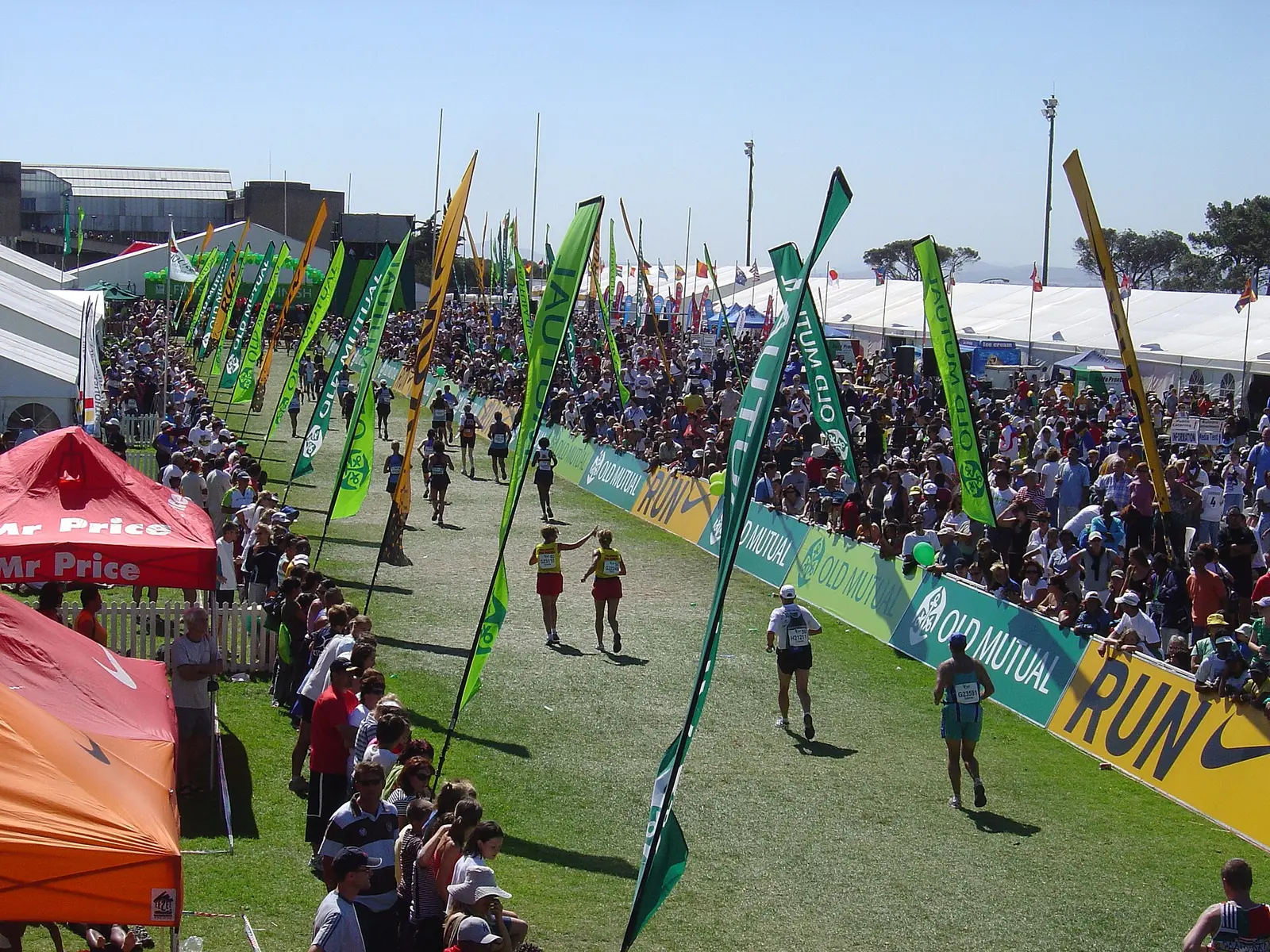 Runners reaching the Two Oceans Marathon finish at the University of Cape Town in 2007
