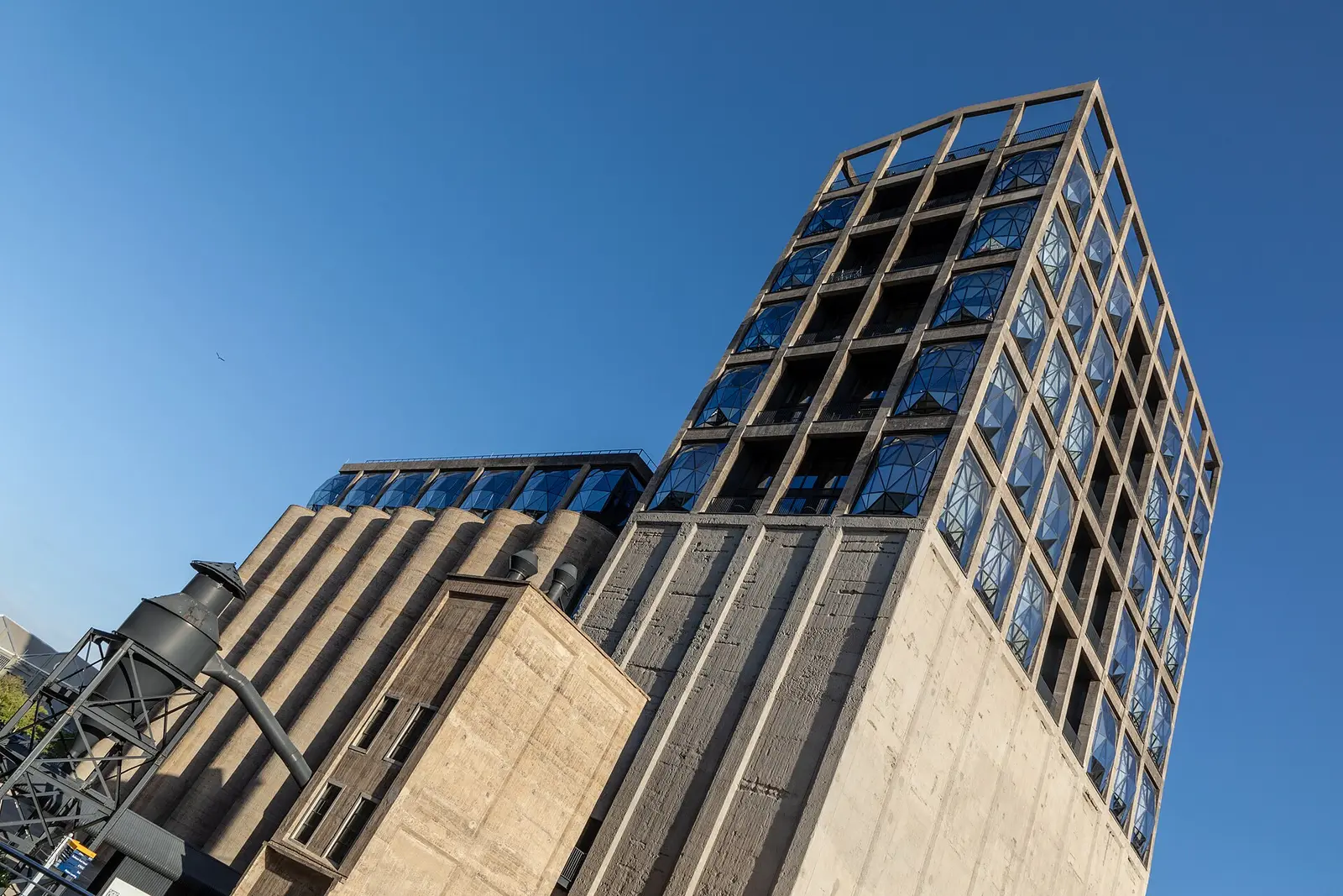 The former grain silo housing Zeitz MOCAA at the V&A Waterfront under a blue sky